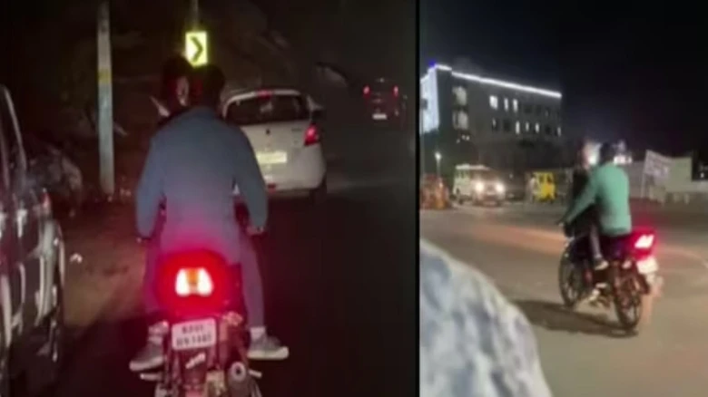 Couple romances dangerously on a moving bike in Ajmer - Watch the viral video