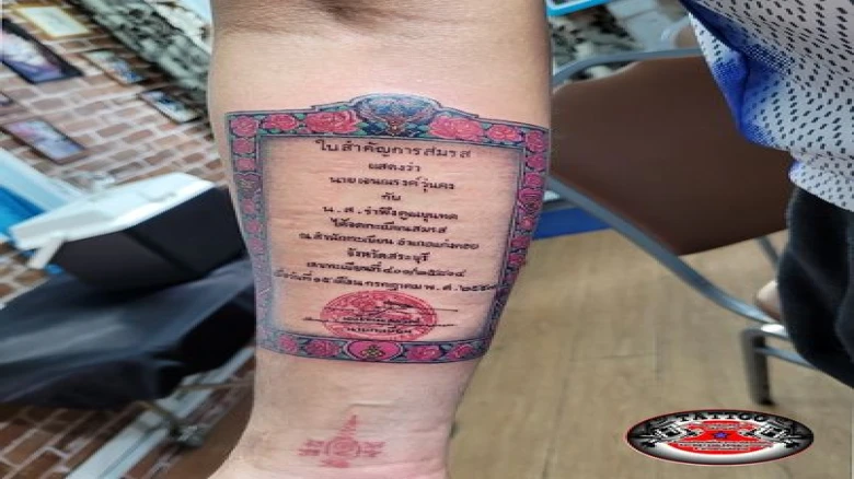 Man surprises his wife by tattooing their marriage certificate on his arm